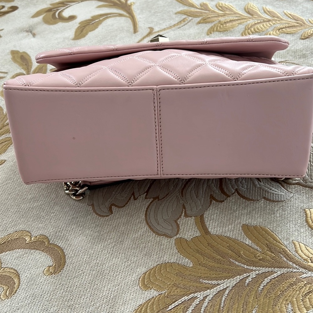 Kate Spade Quilted Blush Handbag with adjustable gold chain.